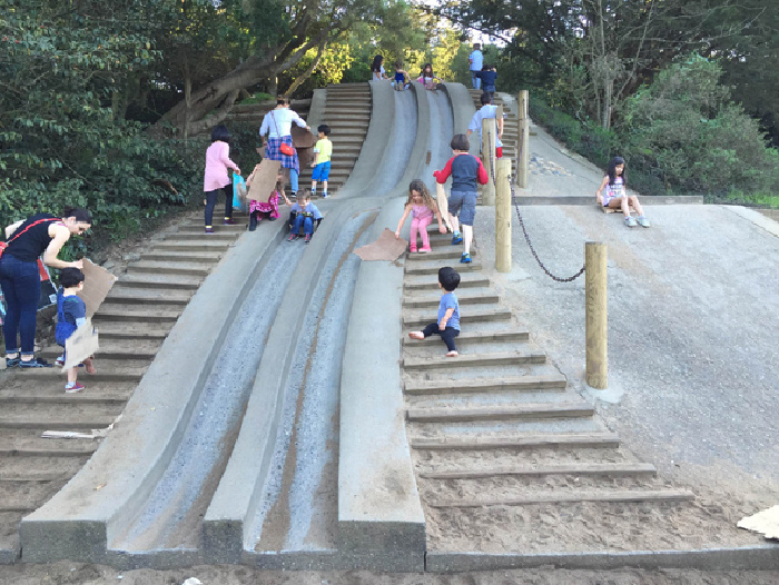 kids approach concrete slide in golden gate park