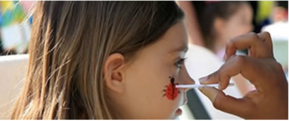 Get your face painted at Orinda Theatre Square Easter party