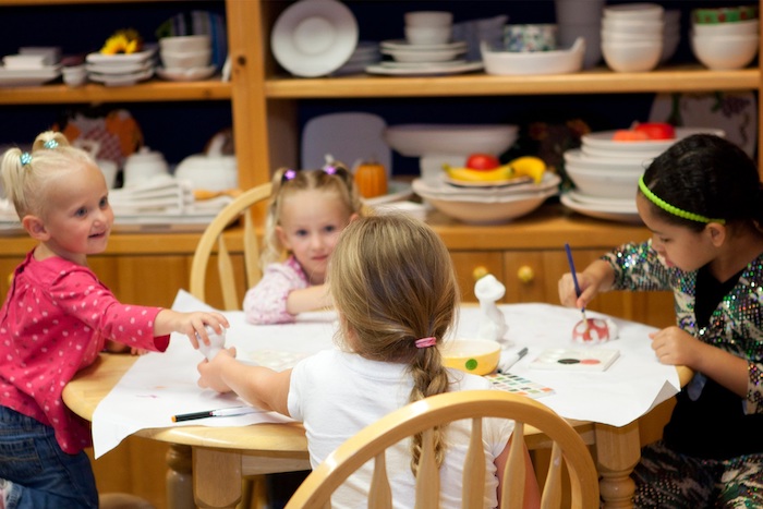 Girls painting ceramics at Color Me Mine Alameda