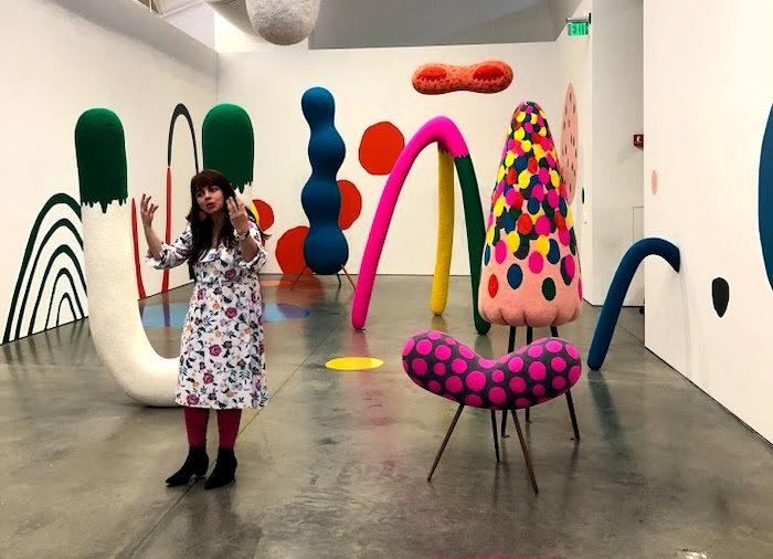 Masako Miki exhibit at BAMPFA with docent