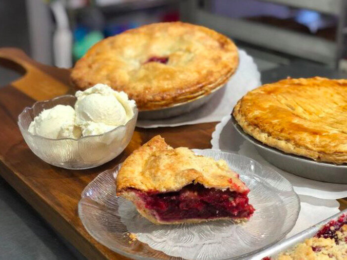 Variety of bakery fruit pies from Fat Apples