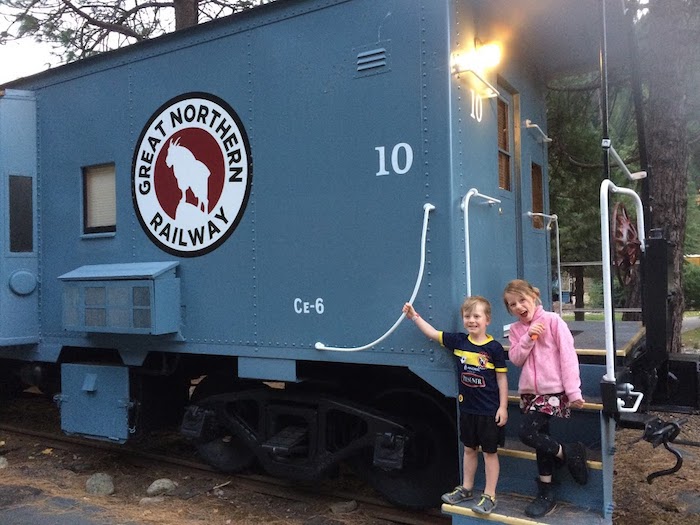 Stay in a caboose like this at Railroad RV Park