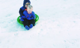 Zayn and Kai on sleds
