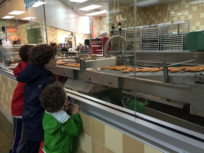 Watch the Krispy Kreme donut production line up close