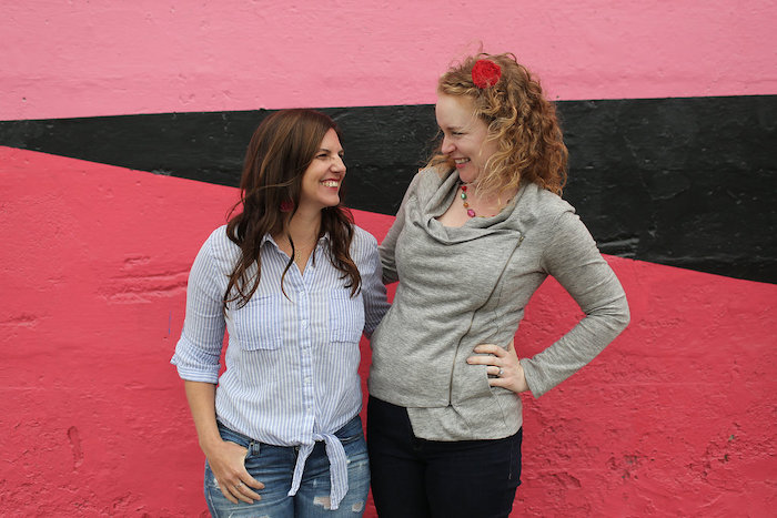 Whitney Moss and Heather Flett, pink wall