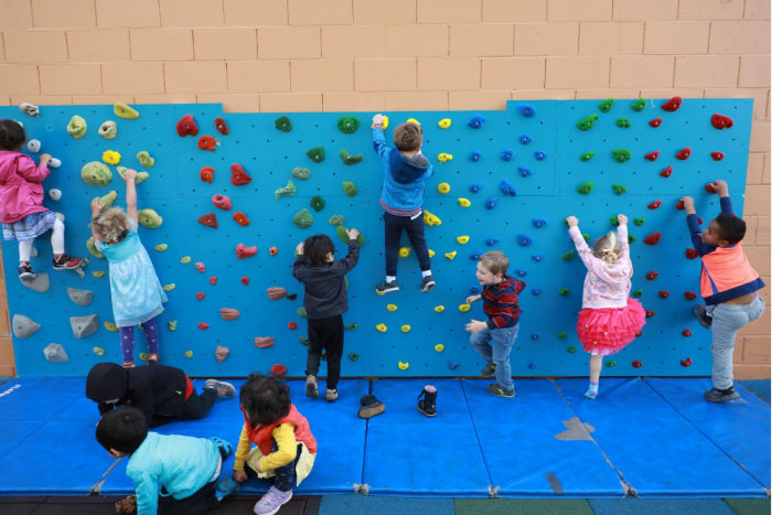 kids on climbing wall
