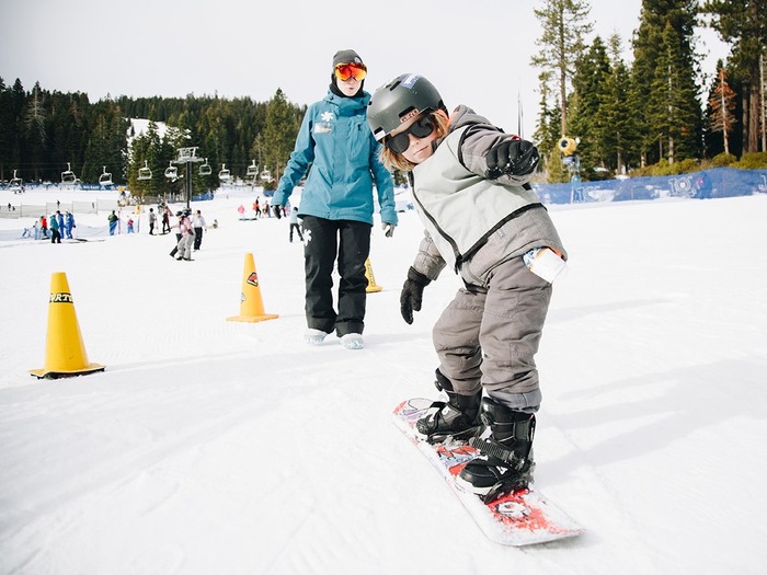 Child snowboarding at Northstar