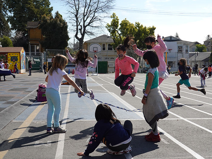 kids jumprope on school playground