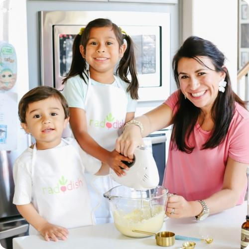 Kids cooking with Raddish kits and mom