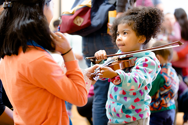 Crowden - Child trying violin