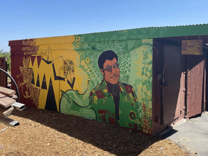 EARTHseed Farm U-Pick Apples & Furry Pigs in Sebastopol 5 octavia butler wall mural on a barn