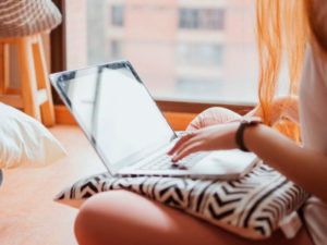 teenager using laptop