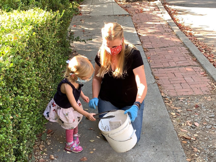 mom and daughter pick up trash plog