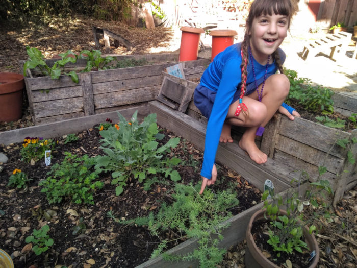 girl is gardening