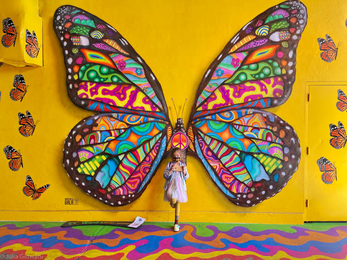 Visit Umbrella Alley and Add a Touch of Kid-friendly Whimsy to an SF Adventure 2 Visiting iconic murals in San Francisco's Umbrella Alley. | Photo: Julia Gidwani