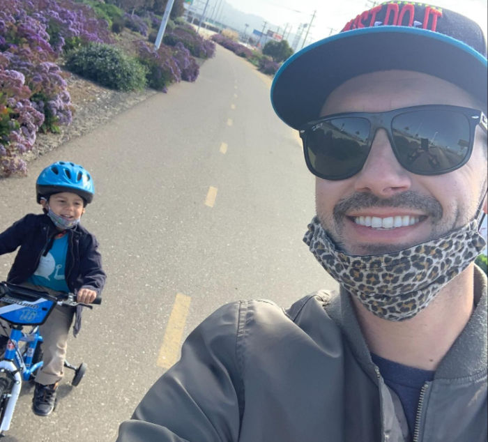 boy biking dad
