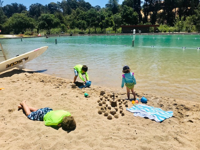 children playing at beach