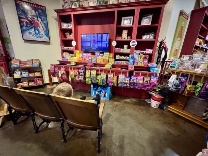 child watching movie at candy store in Lafayette