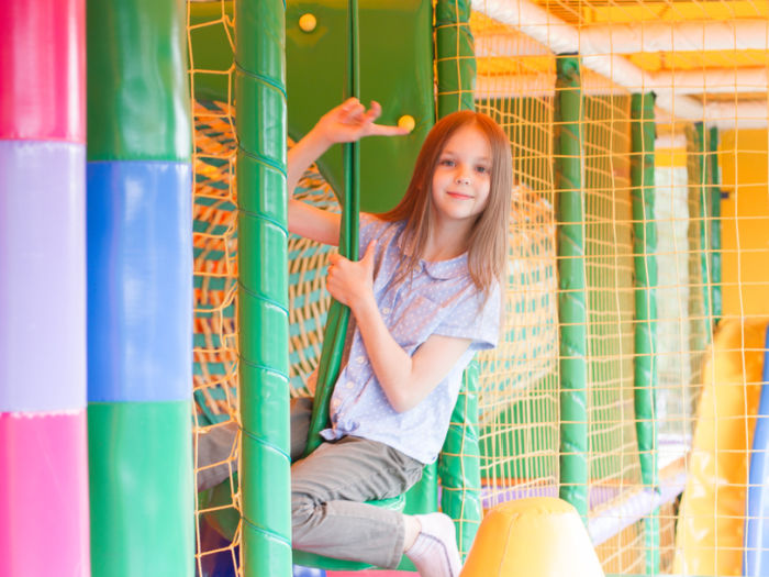 girl climbing on playground