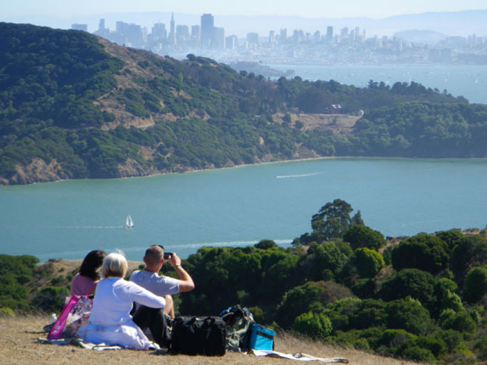 Friends picnicking and enjoying the views of the Bay