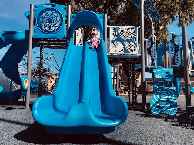 Park Profile: Woodstock Park in Alameda 3 little girl on double slide