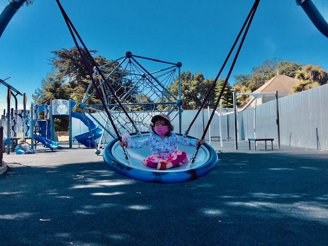 Park Profile: Woodstock Park in Alameda 1 little girl on platform swing