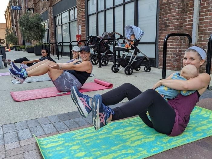 moms and babies exercise on yoga mats