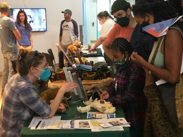 30 Things to Do With East Bay Kids in November 14 Family talking to naturalist about science display