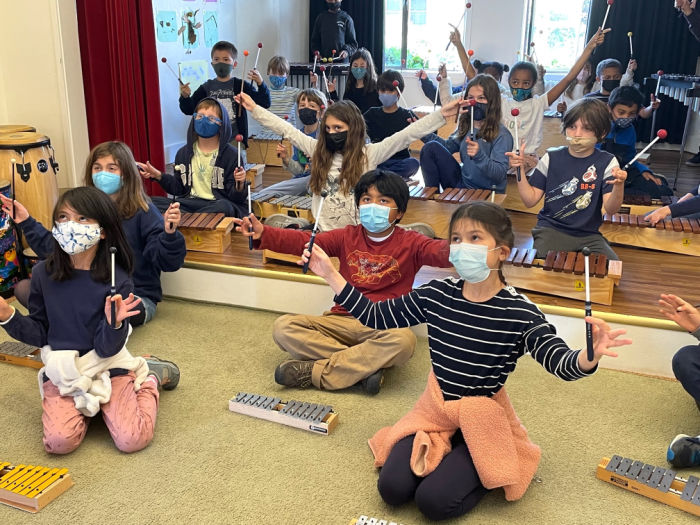 Sponsor Spotlight: Black Pine Circle School 2 kids playing xylophone