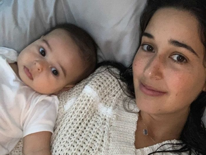 new mom postpartum with baby