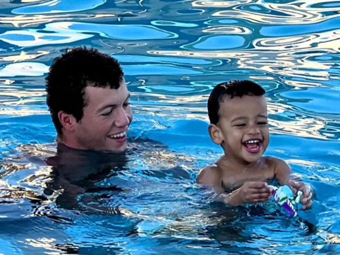 adult and child swimming