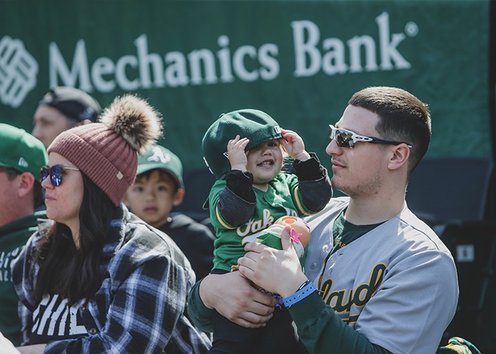 East Bay Father’s Day Guide 2 young fans and parents at an Oakland A's game