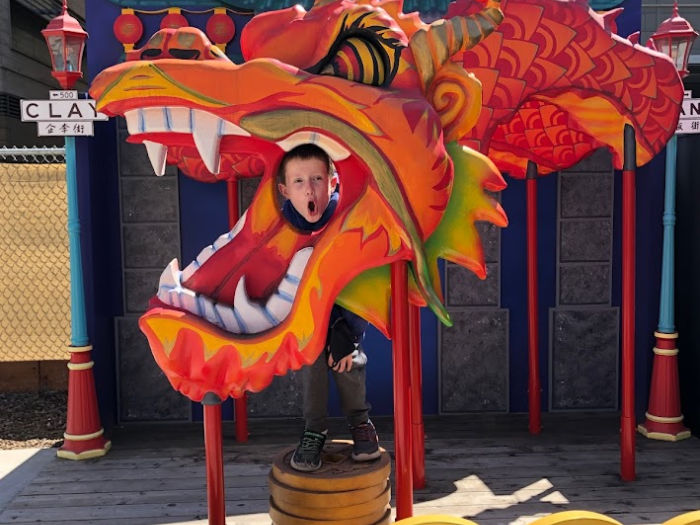 What to Do With Kids Around San Francisco's Chase Center 5 kid in a dragon's head