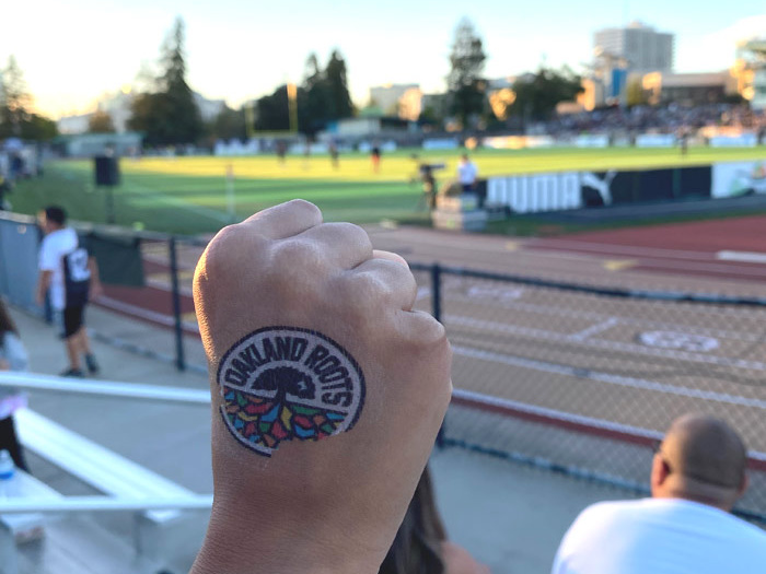 Oakland Roots game kids fist with temp tattoo