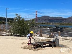water feature child and golden gate bridge