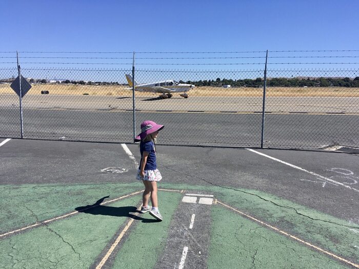 Child watching planes