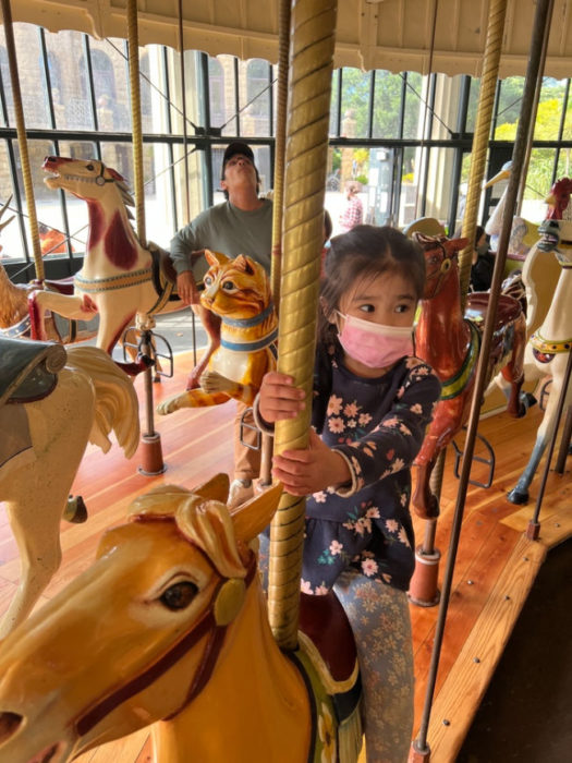 riding carousel at SF Golden Gate Park