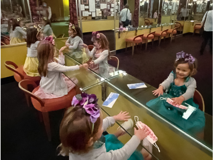 Día de Los Muertos with East Bay Kids 6 three little girls in ballet dresses looking into a mirror