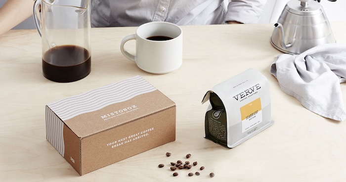 Mistobox coffee subscription a table with a kettle, coffee pitcher, mug, bag of beans and box of beans from mistobox featuring verve coffee