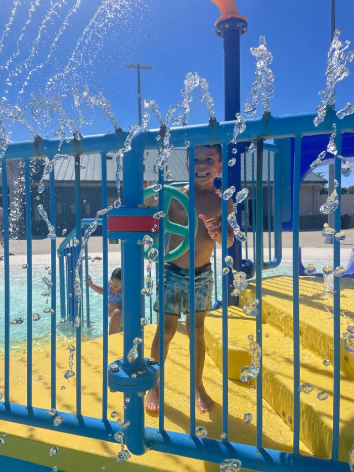 Splashing & Swimming at the San Leandro Family Aquatic Center 1 kid on a splashy play structure