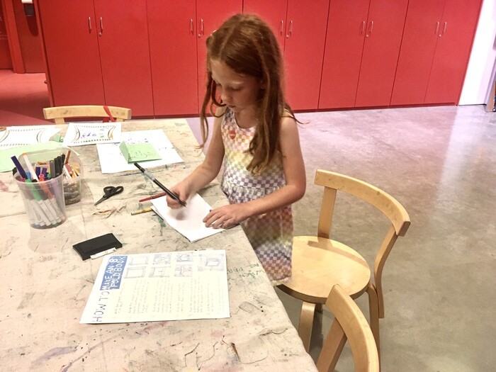 Child making art in Art Lab at BERKELEY ART MUSEUM & PACIFIC FILM ARCHIVE