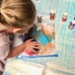 Child working on sensory art project