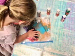 Child working on sensory art project