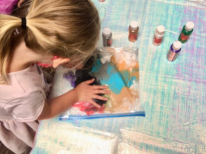 Child working on sensory art project