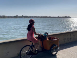 waterfront cargo bike mom and children