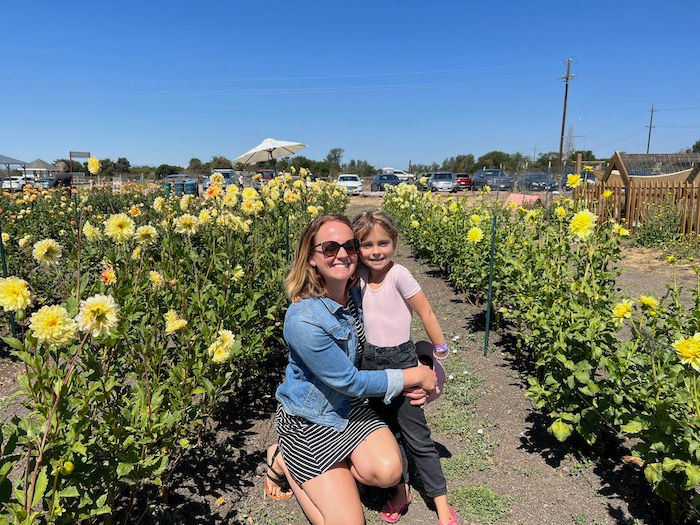 girl and mom in flower fields