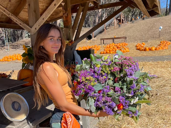 teen with fall wreath