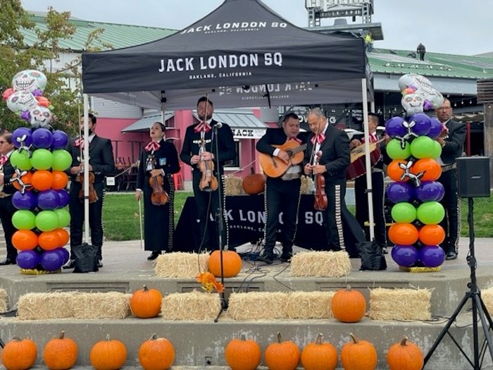 musicians play at Halloween/ Dia de los Muertos Family Fun Fest at Jack London Square