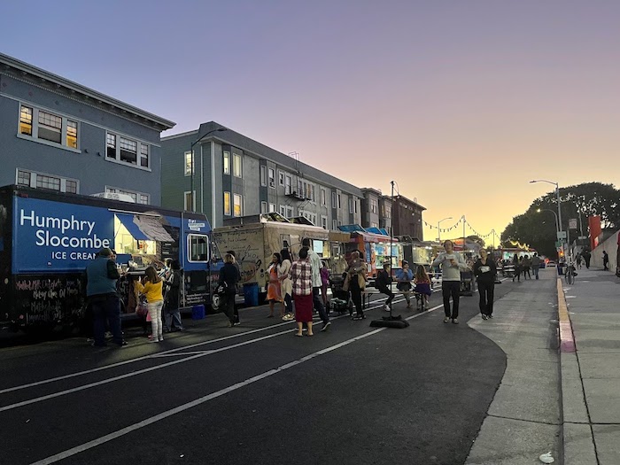 off the grid at omca people and food trucks at twilight