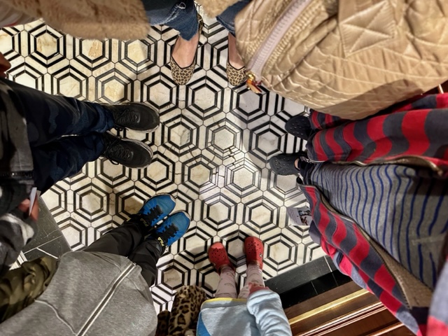 tile floor with peoples shoes